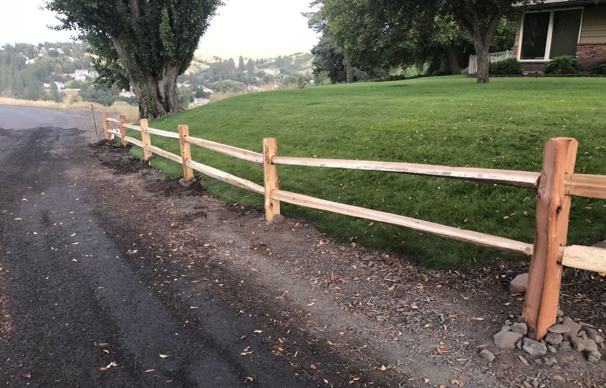 Finished sprit rail fence by North Idaho Post & Pole